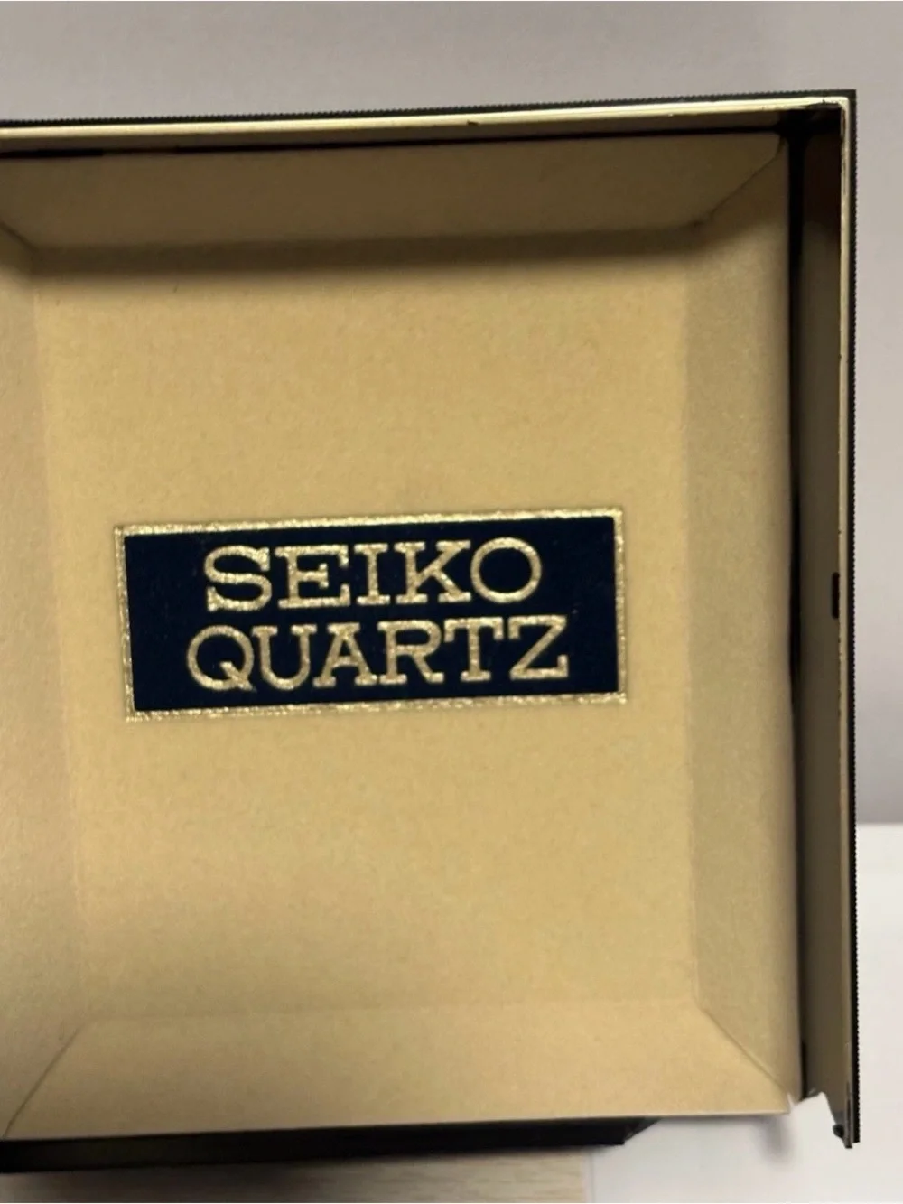 Seiko Men's Digital Quartz Wristwatch Gold Tone A258-5069 with solar panels.